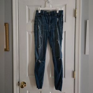 Women's Distressed Blue Jeans
